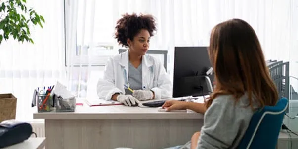 Doctor consulting with a patient about peptide therapy